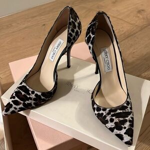 Jimmy Choo Size 9 1/2 pony hair animal print with metallic heel.